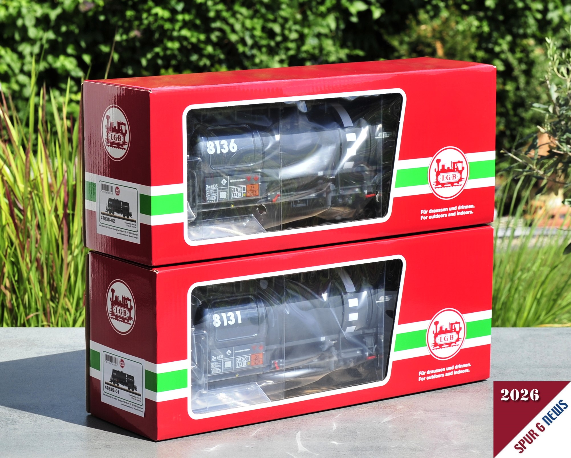 Spur G - Art.Nr. 47835 Die d�nne Schutzfolie wurde entfernt und die beiden vierachsigen RhB Kesselwagen sind in der Verkaufsverpackung ansprechend pr�sentiert. 