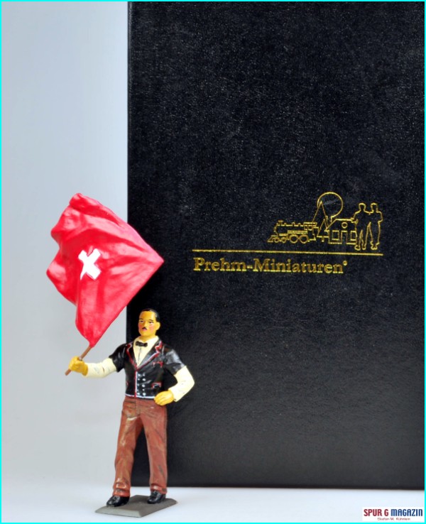 Prehm Miniaturen zeigte seine Metallfiguren fr die RhB und Schweiz Fans. Hier der Fahnenschwinger vor der reprsentativen Geschenkbox die unterm Weihnachtsbaum der Gartenbahner sicherlich sehr gut ankommt!.