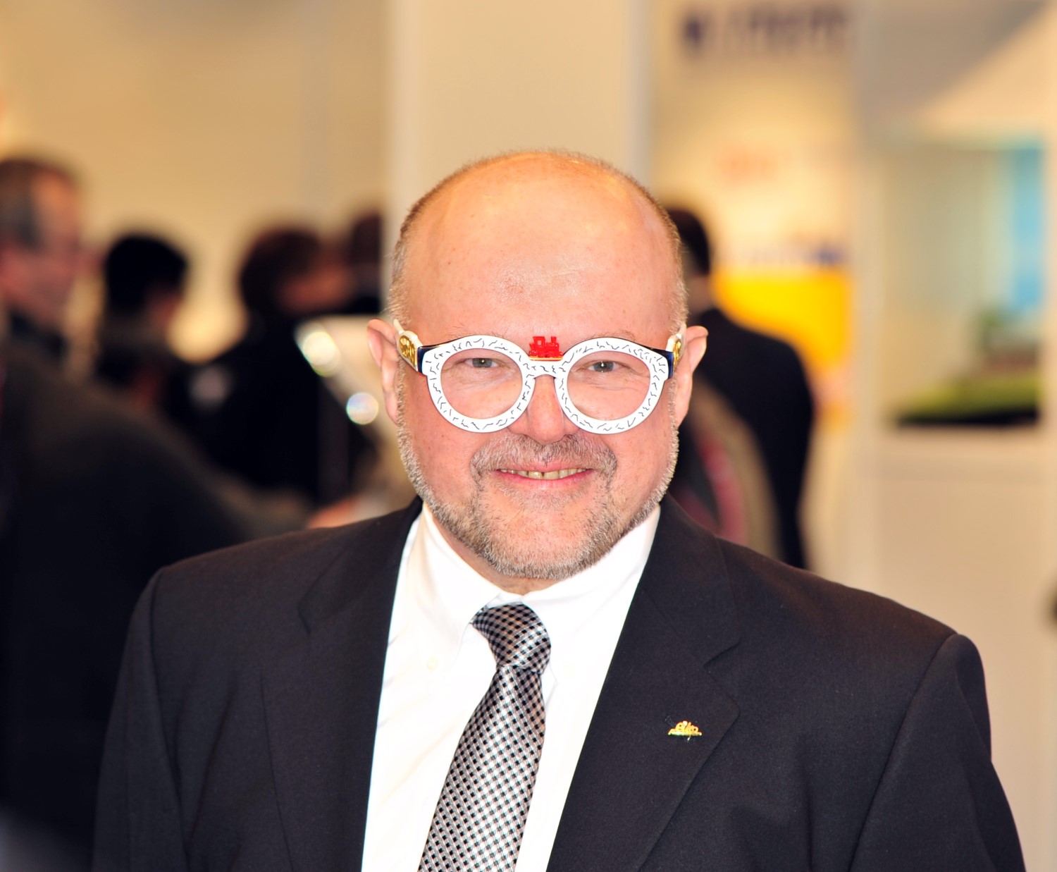 Herr Dr. René F. Wilfer mit neuer Brille auf der Spielwarenmesse 2015