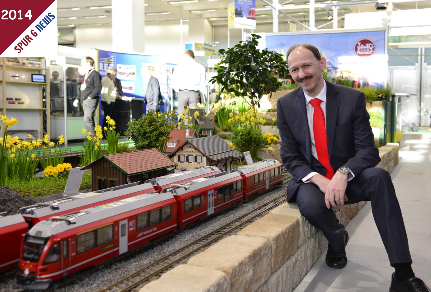 Wolfrad Bächle - Geschäftsführer Märklin-Trix-LGB - Gartenbahnanlage auf der Spielwarenmesse 2014 mit Allegra. 